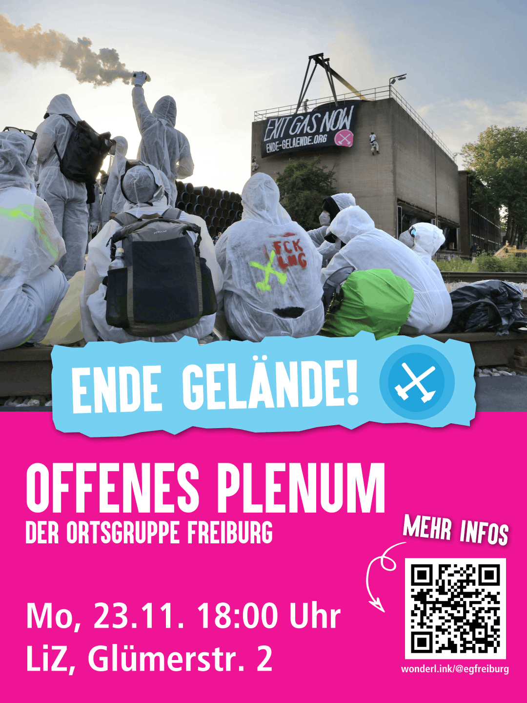 Auf dem Bild sind Aktivist*innen mit weißen Maler*innenanzügen zu sehenSie stehen vor einem Gelände eines Kraftwerks. Vom Dach des Kraftwerks hängt ein Banner "Exit Gas Now".
