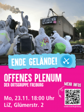 Auf dem Bild sind Aktivist*innen mit weißen Maler*innenanzügen zu sehenSie stehen vor einem Gelände eines Kraftwerks. Vom Dach des Kraftwerks hängt ein Banner "Exit Gas Now".